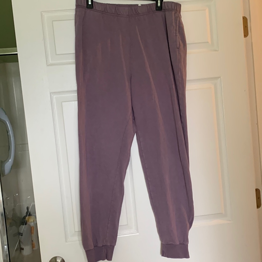 Purple joggers. Side pockets. Light weight. Brand new. Never worn. No stains.